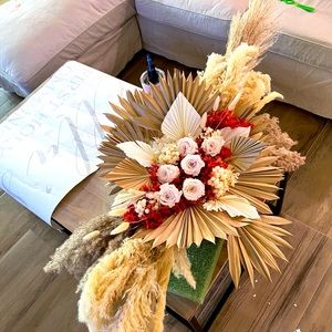 Dry flower arrange used for bridal shower back drop